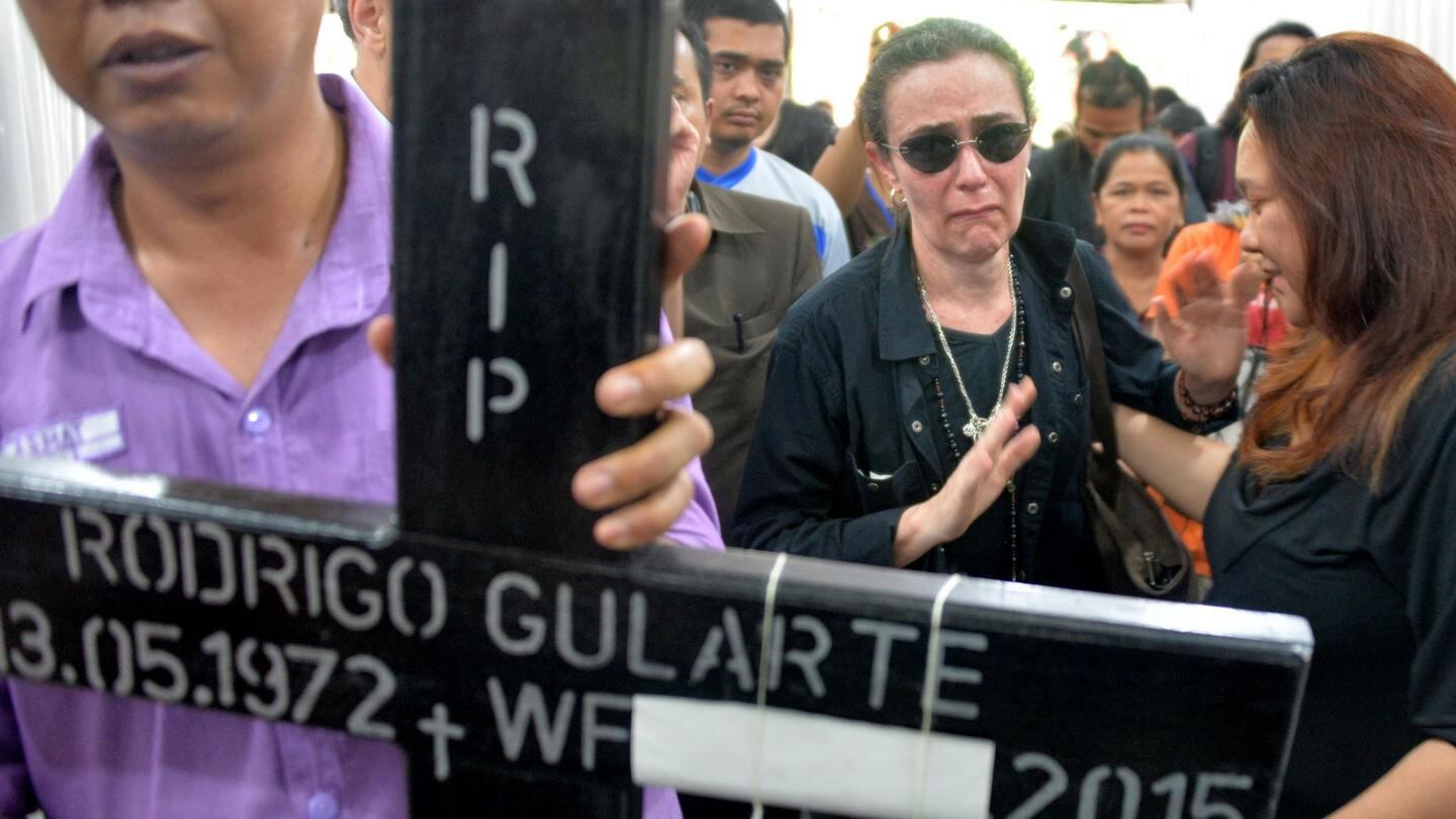 Angelita Muxfeldt (2nd right), cousin of executed Brazilian drug convict Rodrigo Gularte, arrives at the hospital morgue in Jakarta following her cousin’s execution. Photograph:  Bay Ismoyo/AFP/Getty Images