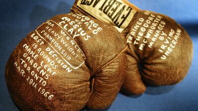 The boxing gloves that Canadian heavyweight boxer George Chuvalo wore in his 1966 bout with Cassius Clay, sit in a case inside the Canadian Sports Hall of Fame. Photo: Peter Power/Toronto Star via Getty Images