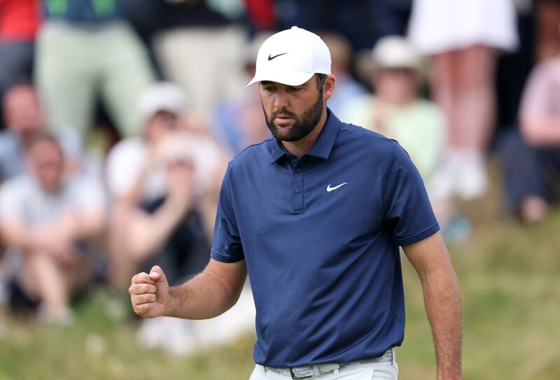 Scottie Scheffler celebrates on the seventh green after saving par during the final round of the Open Championship at Royal Portrush. Photograph: Warren Little/Getty Images