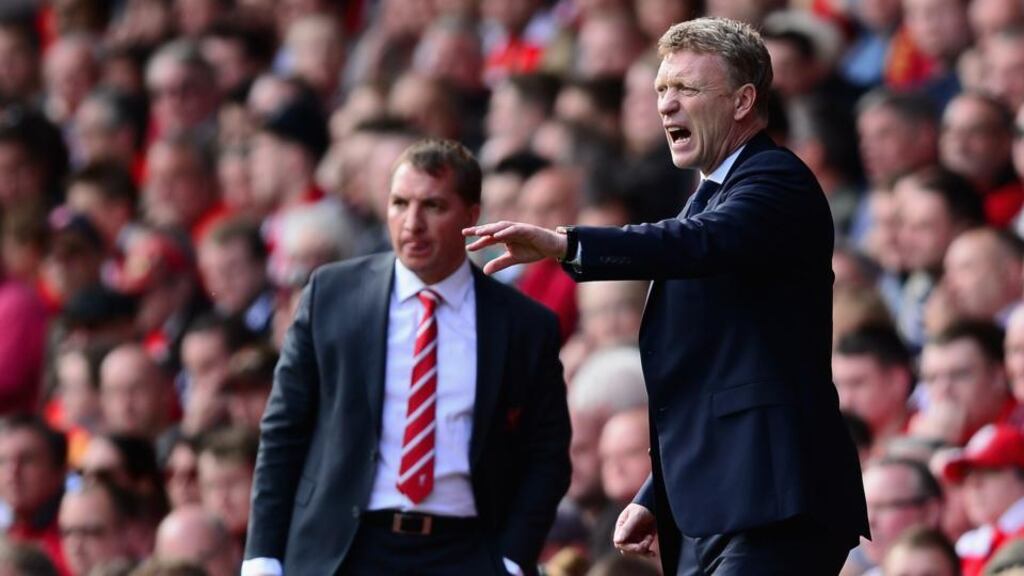 David Moyes gestures as Liverpool Manager Brendan Rodgers looks on during the League match between Liverpool and Everton at Anfield in May. Photograph: Laurence Griffiths/Getty Images