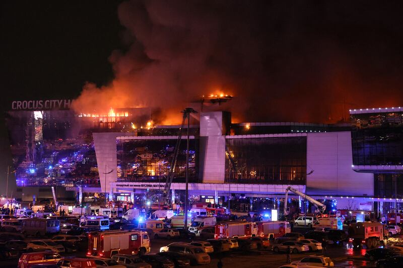 Emergency services outside the burning Crocus City Hall outside Moscow. Photograph: AFP/Getty Images