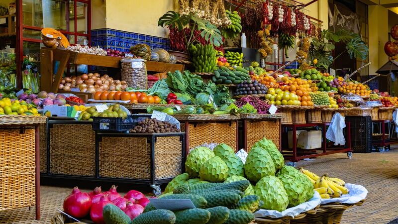 The market in Funchal is a hive of activity with tropical fruits, vegetables and spices on the upper floor; fish and meat are for sale on the lower floor. Photograph: iStock