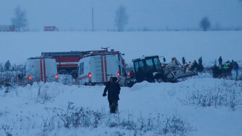 Emergency services work at the location where a short-haul regional Antonov AN-148 plane crashed after taking off from Moscow’s Domodedovo airport, outside Moscow, Russia, on Sunday. Photograph: Maxim Shemetov/Reuters