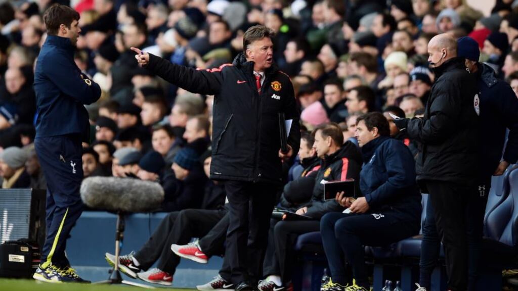 Manchester United manager Louis van Gaal remonstrates with the fourth official as Spurs manager Mauricio Pochettino looks on during the Premier League match at White Hart Lane. Photograph: Jamie McDonald/Getty Images