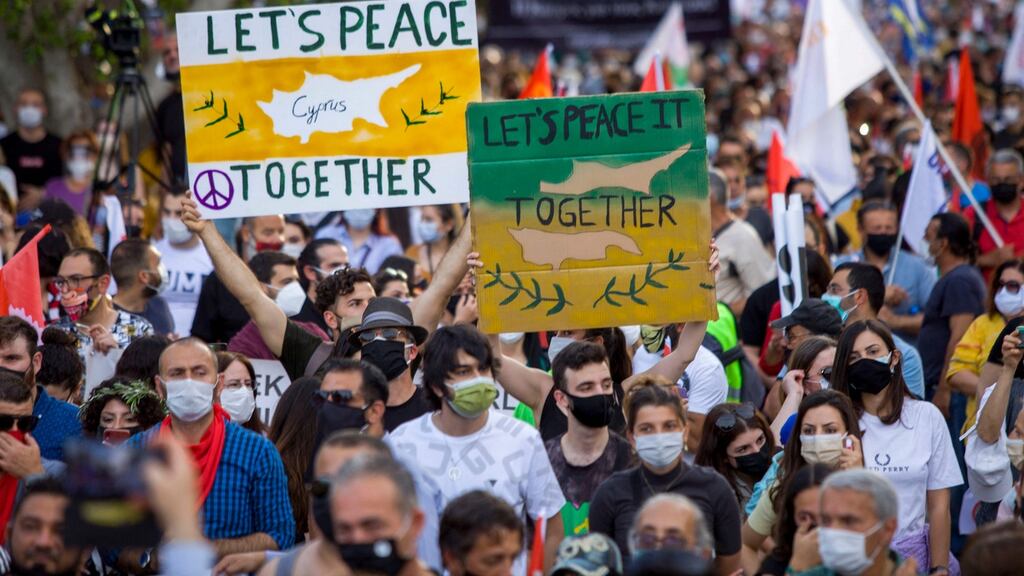 Turkish-Cypriot demonstrators rally in the capital Nicosia calling for a federal solution to the Mediterranean island’s problems. Photograph: Birol Bebek/AFP/Getty