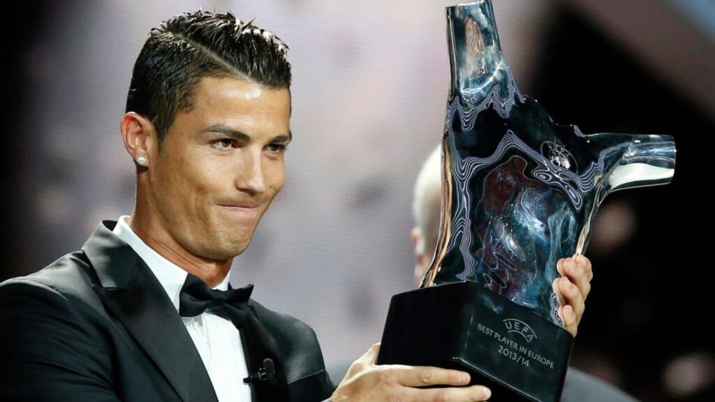 Cristiano Ronaldo of Real Madrid poses with his Uefa’s Best Player in Europe  award at Grimaldi Forum, Monte Carlo, Monaco, last month. Photograph: Sebastien Nogier / EPA