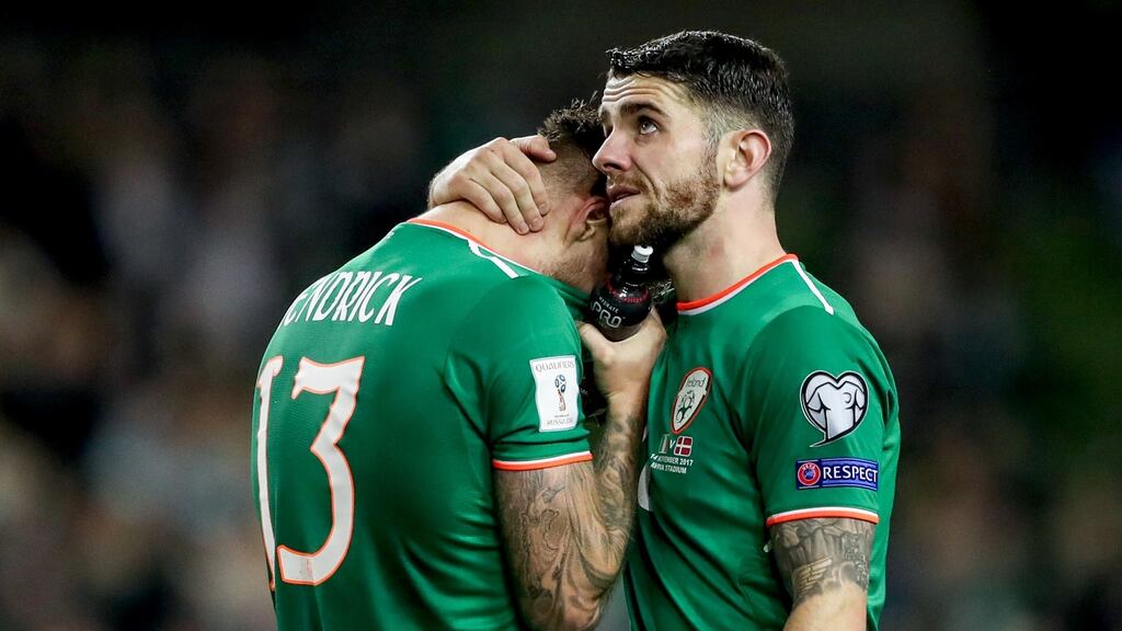 Ireland’s Jeff Hendrick and Robbie Brady dejected after their 5-1 defeat to Denmark in the 2018 World Cup qualifying playoffs. Photo: James Crombie/Inpho