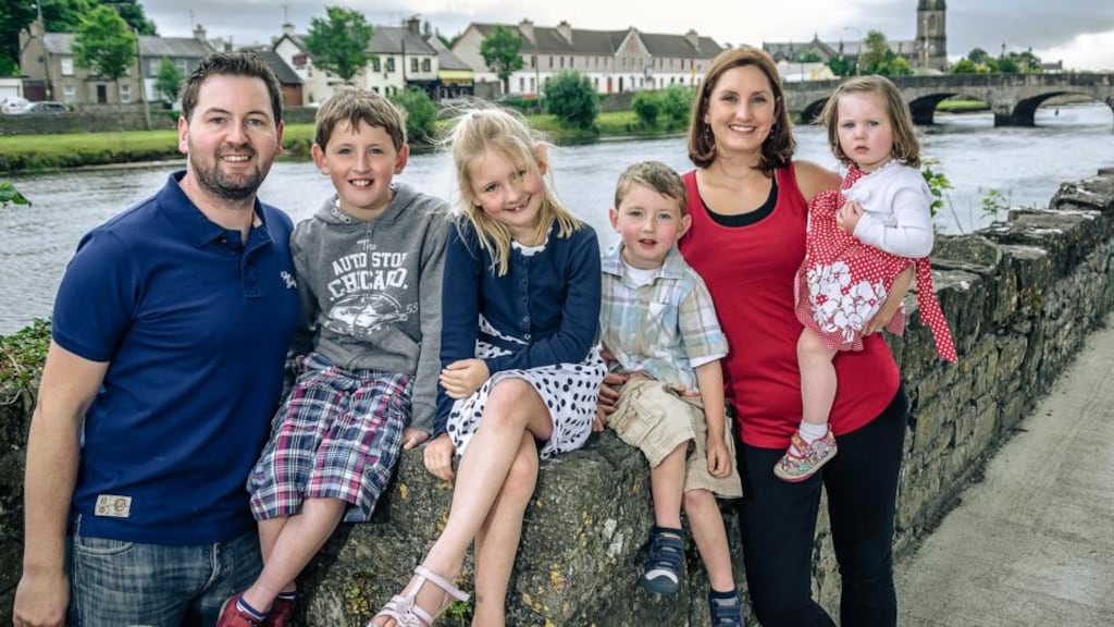Paul, Matthew, Zoe, Ryan, Lèon and Amy Fox enjoy the banks of the river Moy in Ballina, Co Mayo. Paul and Lèon moved there from Dublin in 2004 when they were starting their family