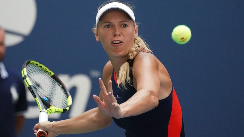 Denmark’s Caroline Wozniacki on her way to defeating Samantha Stosur of Australia. Photograph: Timothy A Clary/AFP/Getty Images