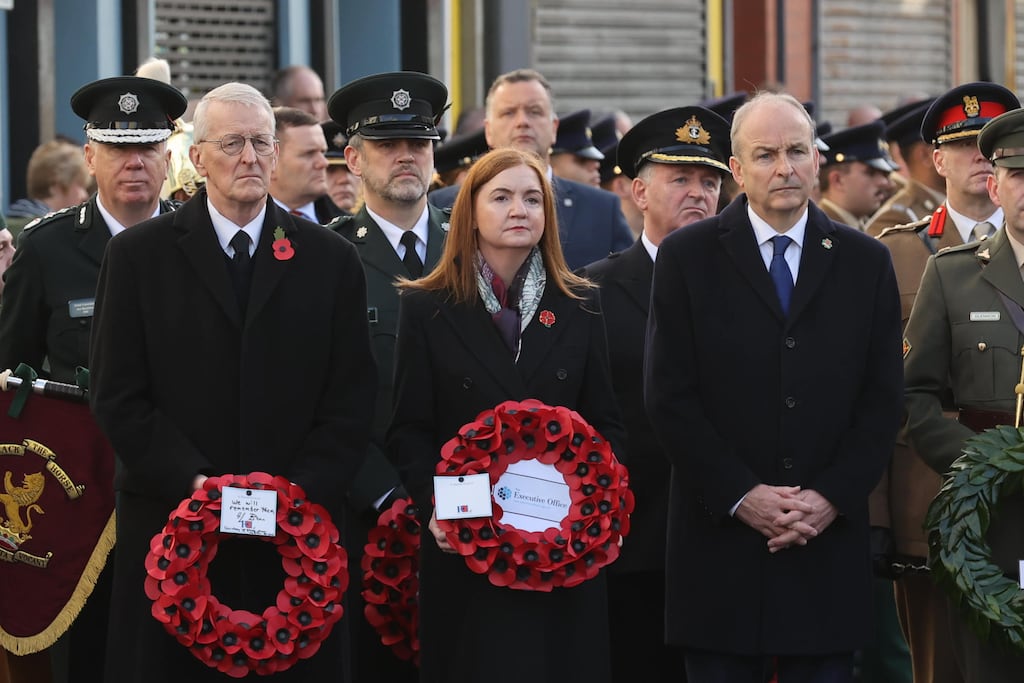 Northern Ireland Secretary Hilary Benn, Head of the Northern Ireland civil service Jayne Brady and Taoiseach Micheál Martin during a Remembrance Sunday service at the Cenotaph in Enniskillen. Photograph: Liam McBurney/PA Wire