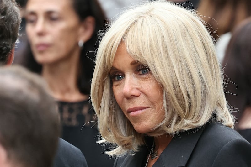 Brigitte Macron pays constant attention to how she carries herself in public for fear of how her image may be distorted or used against her, her daughter told a trial. Photograph: AFP via Getty Images
