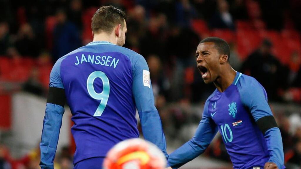 Vincent Janssen celebrates with Georginio Wijnaldum after scoring the first goal for the Netherlands from the penalty spot. Photograph: Stefan Wermuth/Reuters/Livepic