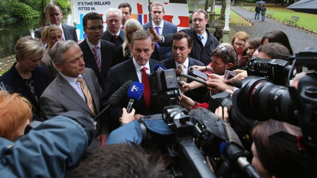 Enda Kenny addresses journalists at Fine Gael’s photocall in St Stephen’s Green. Photograph: Niall Carson/PA Wire