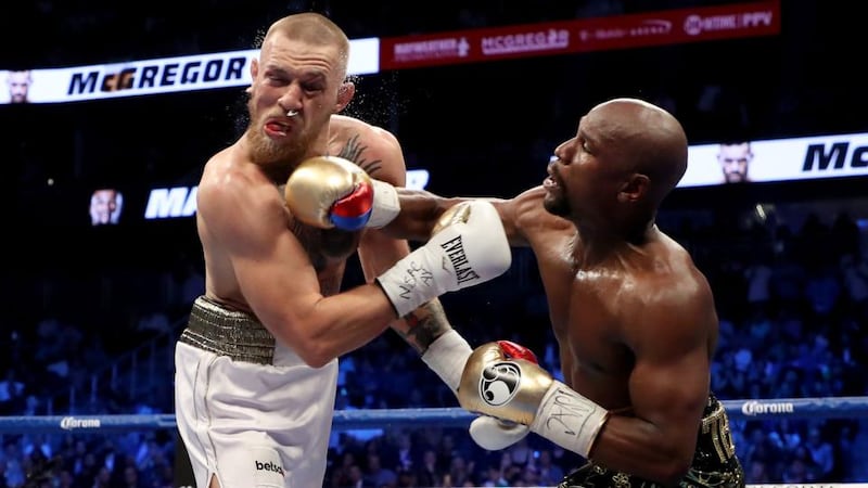 Mayweather catches McGregor with a right-hand. Photo: Christian Petersen/Getty Images
