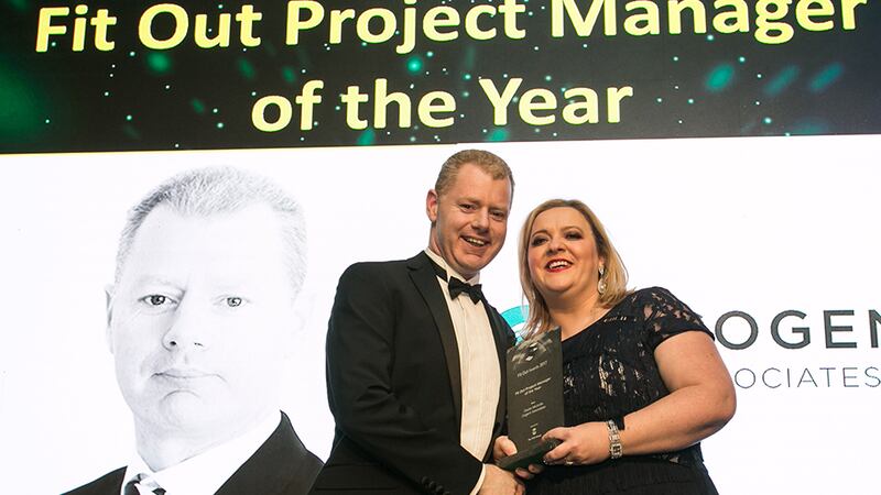 Lorraine Carlisle, CEO, The FKM Group presents the Fit Out Project Manager of the Year award to Ciaran McArdle, Cogent Associates