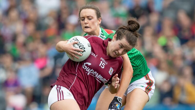 Galway’s Róisín Leonard gets past Mayo’s Ciara McManamon in the semi-final. Photograph: Inpho/Morgan Treacy