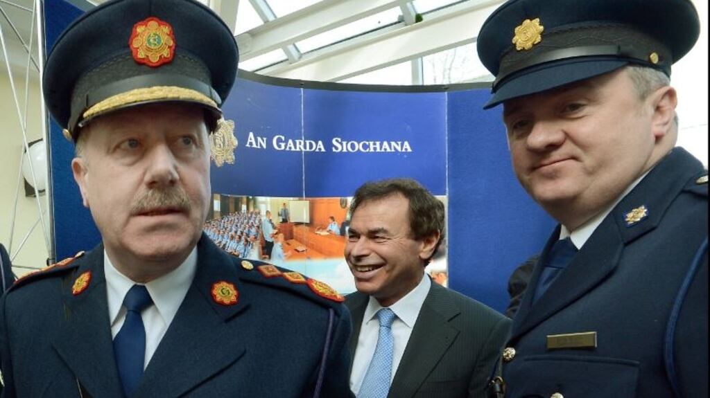 The former head of the Garda Press Office David Taylor (right), pictured in 2013 with then Garda Commissioner Martin Callinan and minister for justice at the time Alan Shatter. Photograph: Brenda Fitzsimons