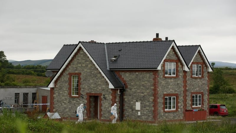 Gardai from the Garda Technical Bureau at the house in Banada, Co Sligo where the body of Shane Skeffington and his badly injured brother Brandon were found. Brandon died shortly after he was taken to hospital following an incident at the house. Photograph : Keith Heneghan