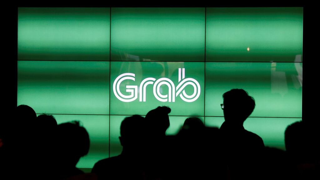 The current deal cements an alliance between SoftBank, Didi and Grab, which competes against Uber in markets from Malaysia to Thailand. Photograph: Reuters