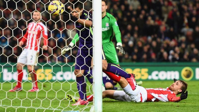 Manchester City’s Sergio Aguero handles the ball across the line before having the goal disallowed at Britannia Stadium. Photograph: Getty Images