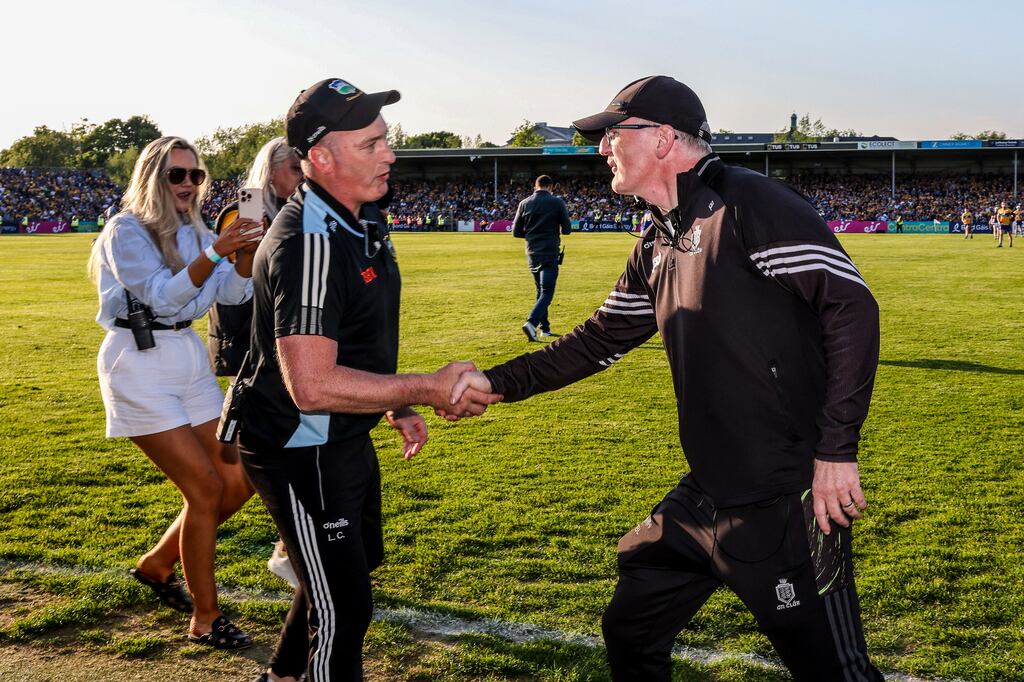 Tipperary manager Liam Cahill shakes hands with Clare counterpart Brian Lohan after Saturday's Munster SHC match in Ennis. Photograph: Natasha Barton/Inpho