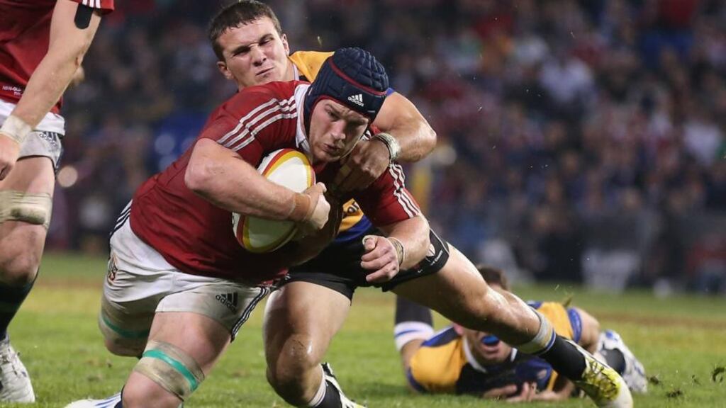 Seán O’Brien dives over to score a try for the Lions against Combined Country at Hunter Stadium in Newcastle, Australia. Photograph: David Rogers/Getty Images.
