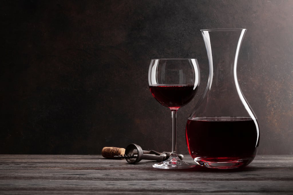 Decanting and using good quality wine glasses can increase the enjoyment of even inexpensive bottles of wine. Photograph: iStock