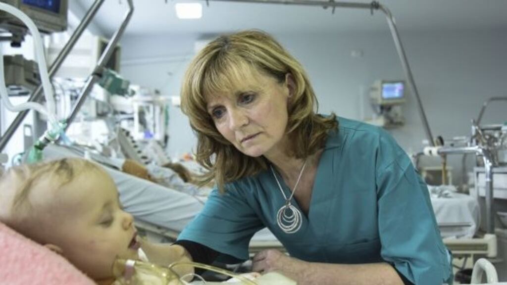 Adi Roche with baby Victoria Doronona in the cardiac unit of Kharkiv general hospital, eastern Ukraine, in 2015. Ms Roche is set to be nominated for the award in the coming weeks by Cork’s Lord Mayor.