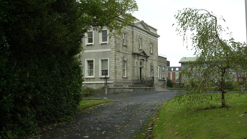 Neptune House at Temple Crescent, Blackrock, Co Dublin, after its mother and baby home days and prior to its redevelopment as private housing. The annexe is visible in the background.
