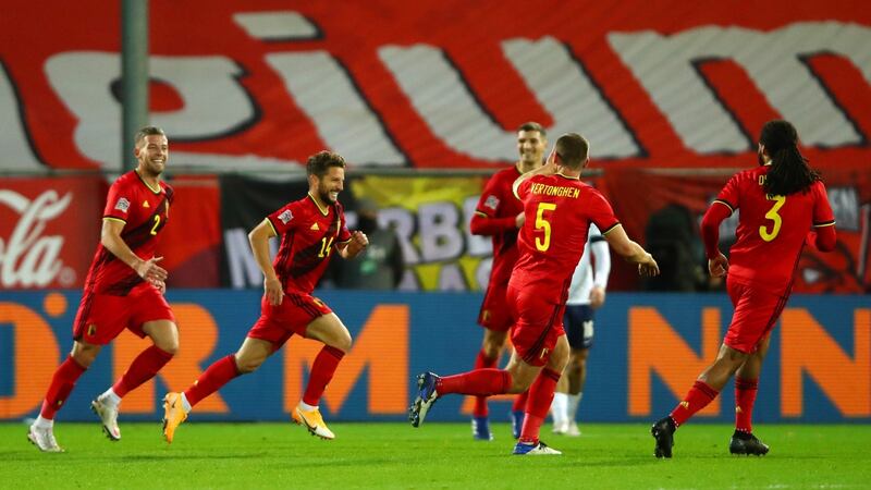 Dries Mertens celebrates after scoring Belgium’s second goal against England. Photograph: Dean Mouhtaropoulos/Getty