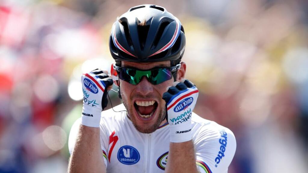 Mark Cavendish celebrates as he crosses the finish line to win the 173 km 13th stage of the Tour de France from Tours to Saint-Amand-Montrond. Eric Gaillard/Reuters