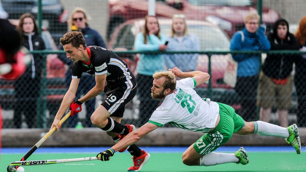 Conor Harte challenges Germany’s Johannes Grobe during Ireland’s 2-1 victory at Pembroke Wanderers Hockey Club in Dublin. Photograph: Gary Carr/Inpho