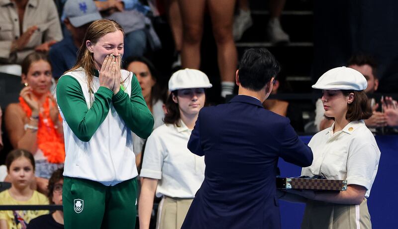 Mona McSharry receives her bronze medal following the 100m Breaststroke final in Paris. Photograph: James Crombie/Inpho