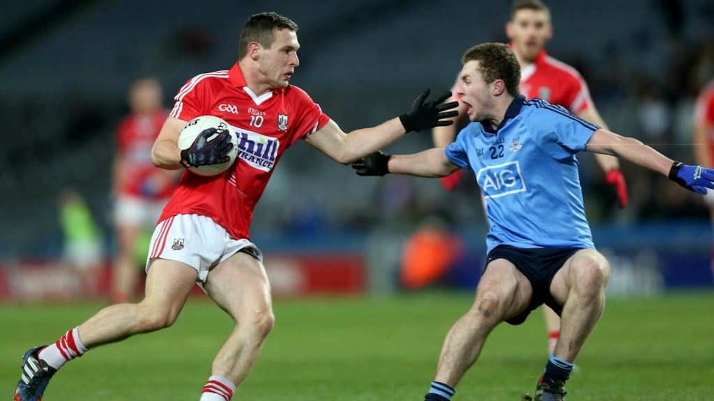 Jack McCaffery of Dublin with John O’Rourke of Cork during Dublin’s last home league loss in March 2014. Photograph: Donall Farmer/Inpho