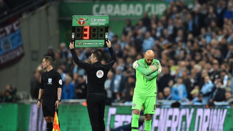 Substitute goalkeeper Willy Caballero prepares to come on before returning to the bench. Photo: Glyn Kirk/Getty Images