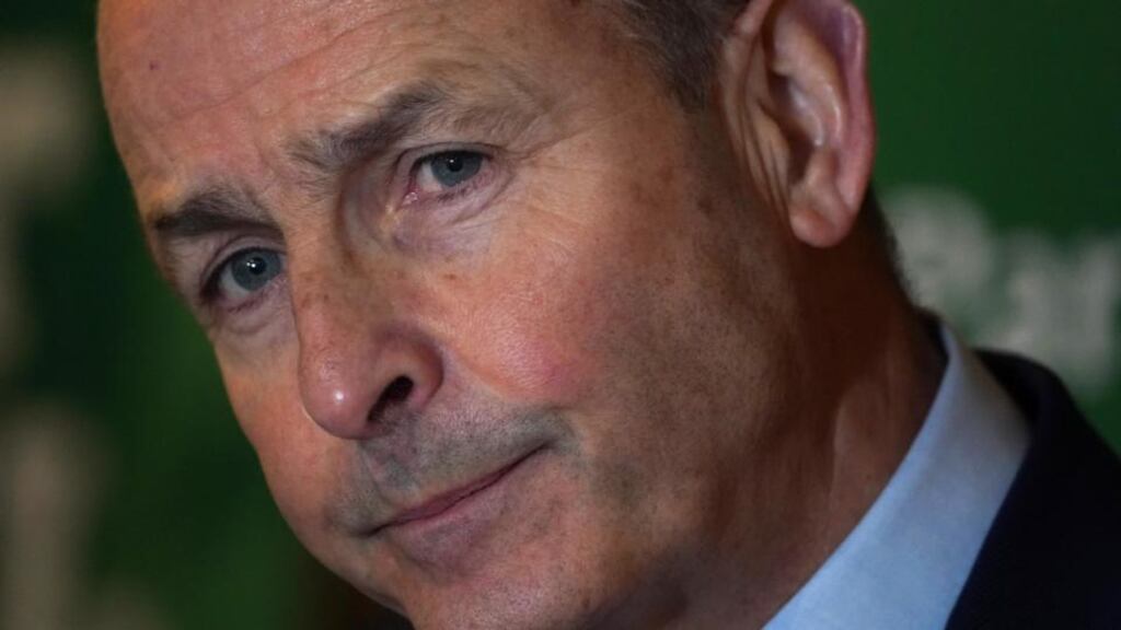 Taoiseach Micheál Martin: It is his personal view that people should continue to wear masks on public transport and in retail outlets. Photograph: Brian Lawless/PA Wire