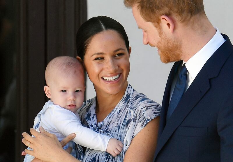 Britain’s Prince Harry and his wife Meghan holding their son Archie at the Desmond and Leah Tutu Legacy Foundation in Cape Town, South Africa in September 2019. Photograph: Toby Melville/EPA
