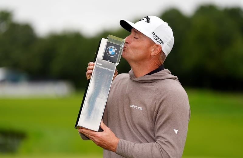 Alex Norén celebrates with the trophy after winning the 2025 BMW PGA Championship at Wentworth. Photograph: Adam Davy/PA
