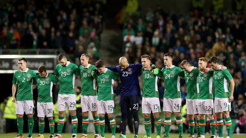 Ireland stand for a minutes silence prior to their international friendly clash with Switzerland. Photo: Inpho