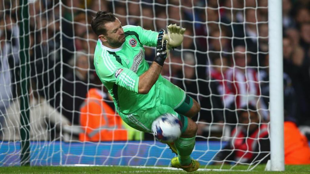 Goalkeeper Mark Howard of Sheffield United saves Enner Valencia’s penalty in the shoot out between West Ham United and Sheffield United at the Boleyn Ground. Photograph: Paul Gilham/Getty Images