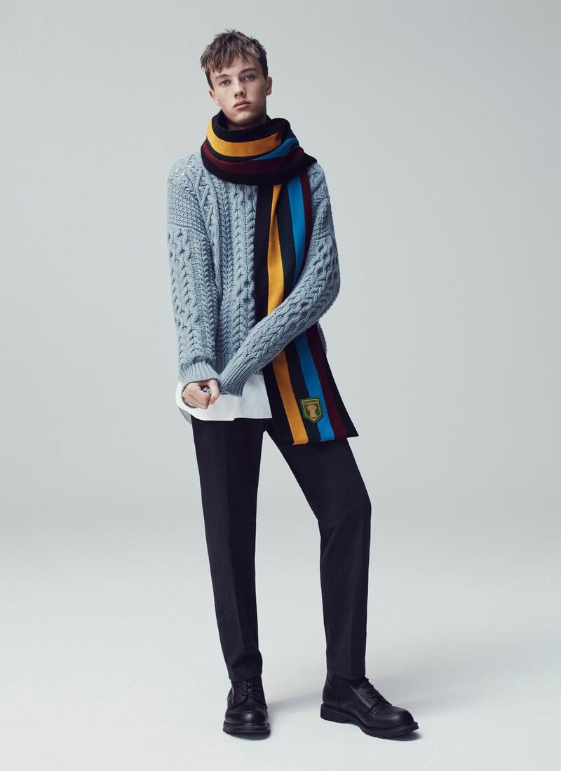 Distressed cable jumper €545, tunic shirt €215, rose T-shirt €85, military chino €275, all from Kent & Curwen