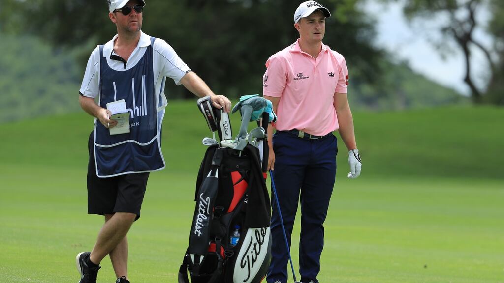Paul Dunne and his caddy Darren Reynolds during round two of the Alfred Dunhill Championship at Leopard Creek Golf Club, South Africa. Photo: Getty Images