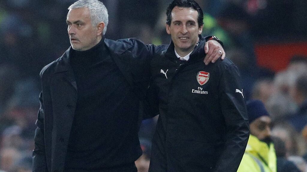 Manchester United manager Jose Mourinho with Arsenal manager Unai Emery after the final whistle at Old Trafford. Photograph: Reuters