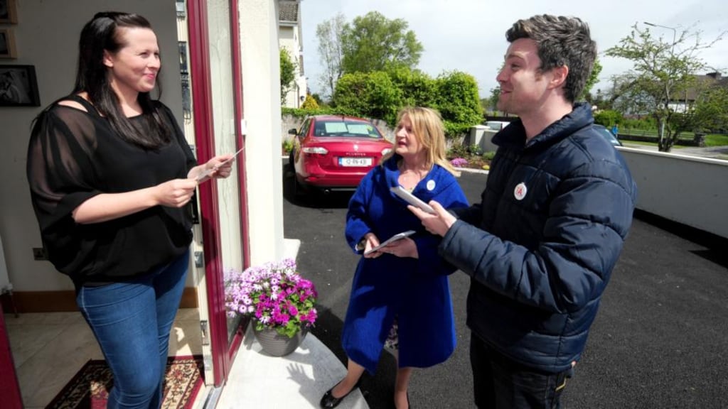 Séamus Carey and Regina Bushell from Westmeath, canvassing for Yes Equality, speaking to Jennifer O’Meara from Athlone. Photograph: James Flynn/APX