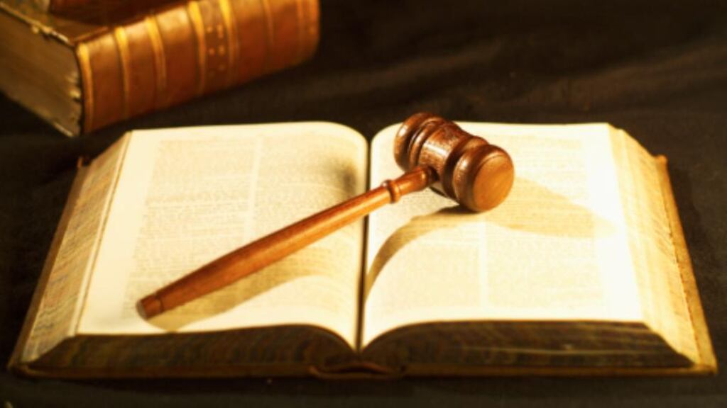 A husband and wife are to fight new attempts to have them stand trial for the killing of a man shot dead in Belfast