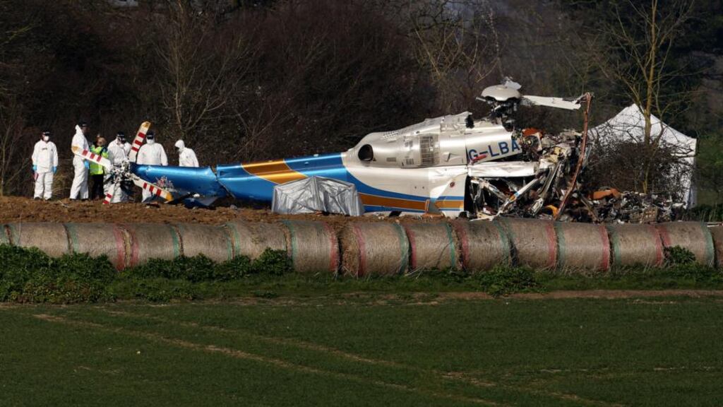 Experts scouring the wreckage of the helicopter crash which killed millionaire Northern Ireland businessman Eddie Haughey and three others will begin recovering crash debris today.
Photograph: Chris Radburn/PA Wire