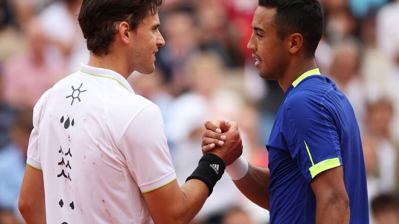 Dominic Thiem of Austria congratulates Hugo Dellien of Bolivia after his  singles first round on day one  of the 2022 French Open at Roland Garros in Paris, France. Photograph:   Adam Pretty/Getty