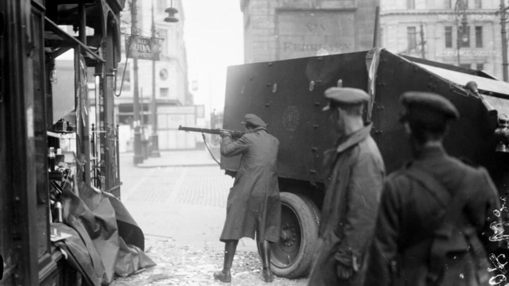 National Army soldiers in action at O’Connell Street, Dublin during the civil war. Photograph: Irish Photographic Archive