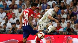 Gareth Bale limps out of Madrid derby with groin strain