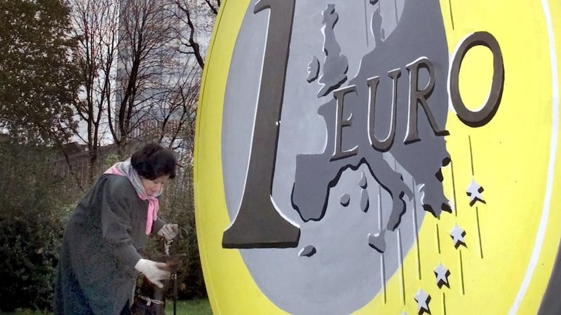Huge reproduction of a one-euro coin at the foot of the office tower of the European Central Bank in Frankfurt/Main, Germany. Photograph: Frank Rumpenhorst/AP